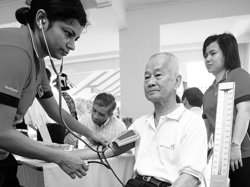 A senior citizen participating in a free health screening session at a National Kidney Foundation  open house. Some people surveyed by the HPB feel that a normal result following screening would cause undue emotional distress beforehand besides being a waste of time and money, while abnormal test results would burst their blissful bubble. So they perceive screening as a lose-lose situation. 
TODAY FILE PHOTO