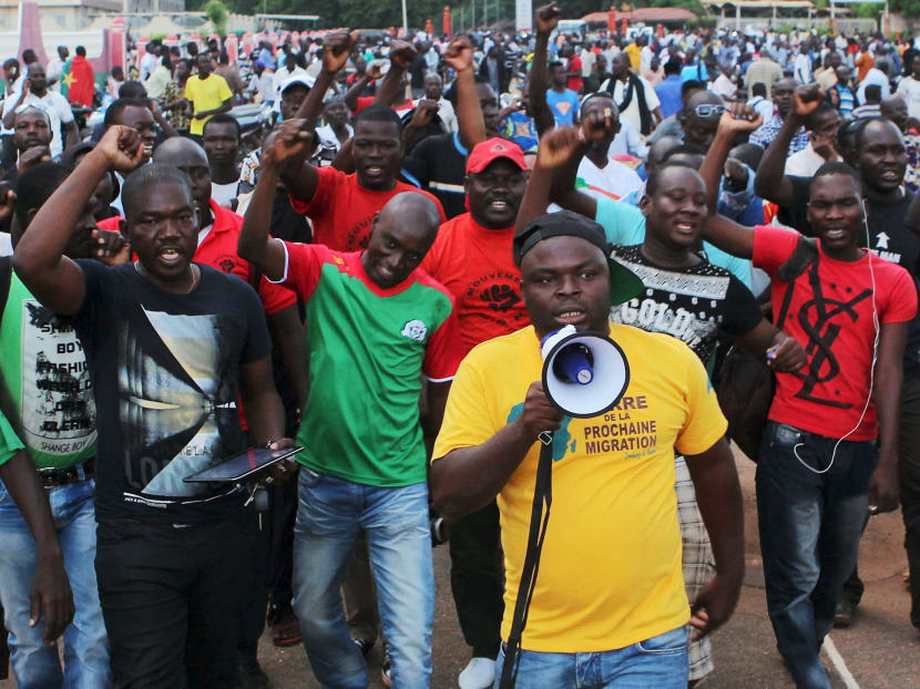 Protesters chant slogans against the presidential guard in Ouagadougou, Burkina Faso, on Sept 16, 2015. Photo: Reuters