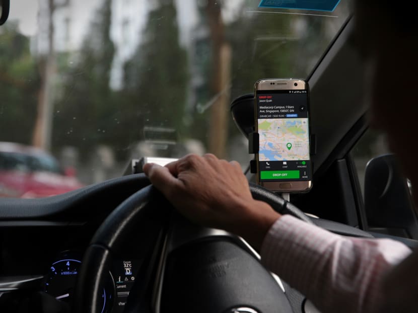 Interim measures ordered by the Competition and Consumer Commission of Singapore  will allow potential ride-hailing players to build up their network of drivers, without putting the market leader Grab at a disadvantage, analysts said. Jason Quah/TODAY