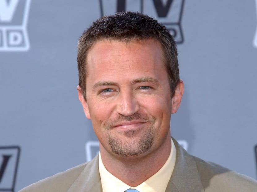Grieving fans flock to 'Friends' New York apartment to mourn Matthew Perry