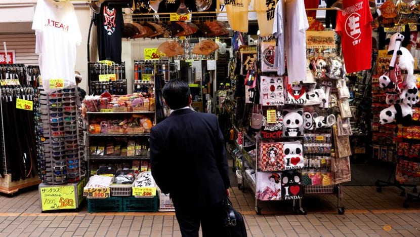 Japan's household spending falls as rising costs squeeze consumers