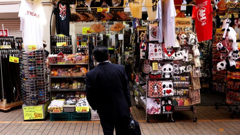 Japan's household spending falls as rising costs squeeze consumers Japan's household spending falls as rising costs squeeze consumers