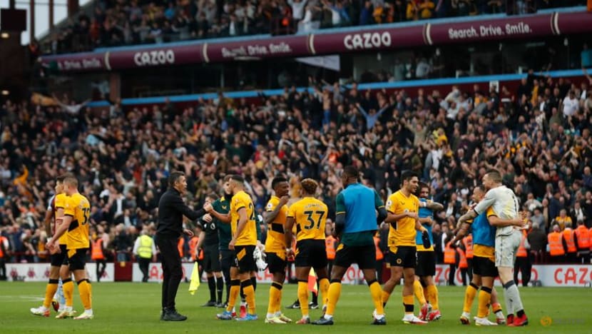 Wolves grab last-gasp 3-2 win at Villa in derby thriller Wolves grab last-gasp 3-2 win at Villa in derby thriller