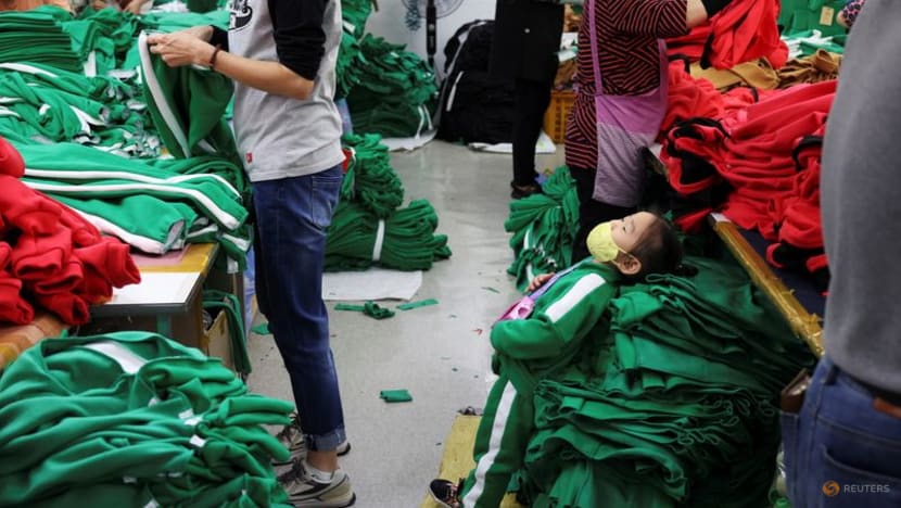 High demand for 'Squid Game' tracksuits cheers S Korea's struggling garment sector