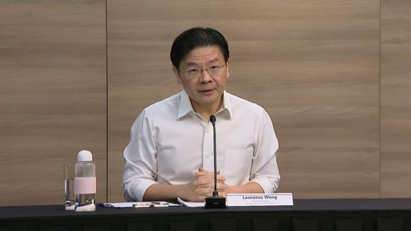 Singapore on track to increasing group sizes for 'higher-risk' settings in July, including for dining-in: Lawrence Wong