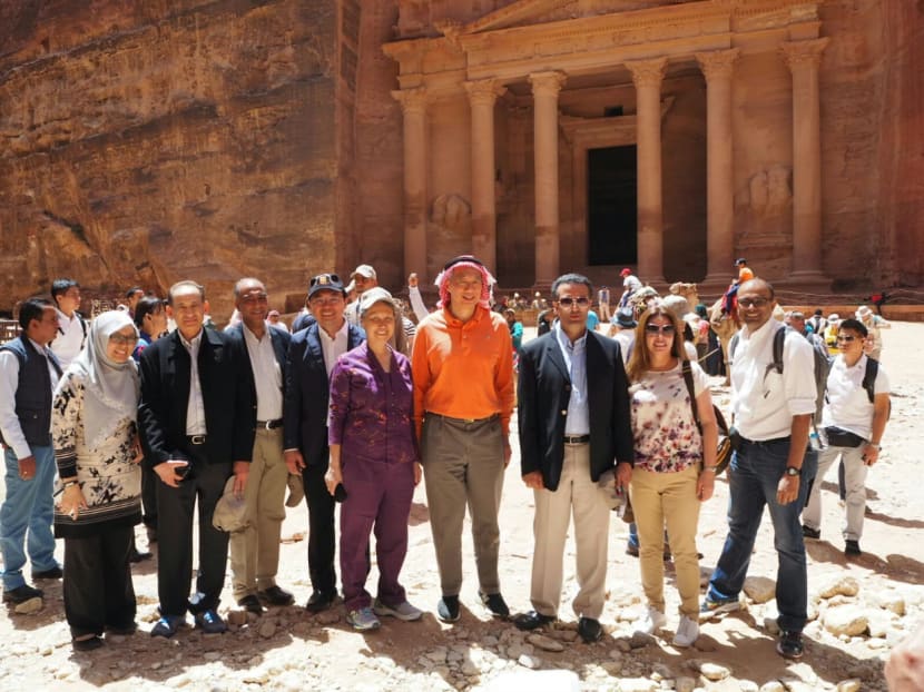 PM Lee Hsien Loong with Mr Nayef H Al-fayez, Minister at Jordan's Ministry of Tourism and Antiquities, and other members of the Singapore delegation at Petra. Photo: Albert Wai/TODAY