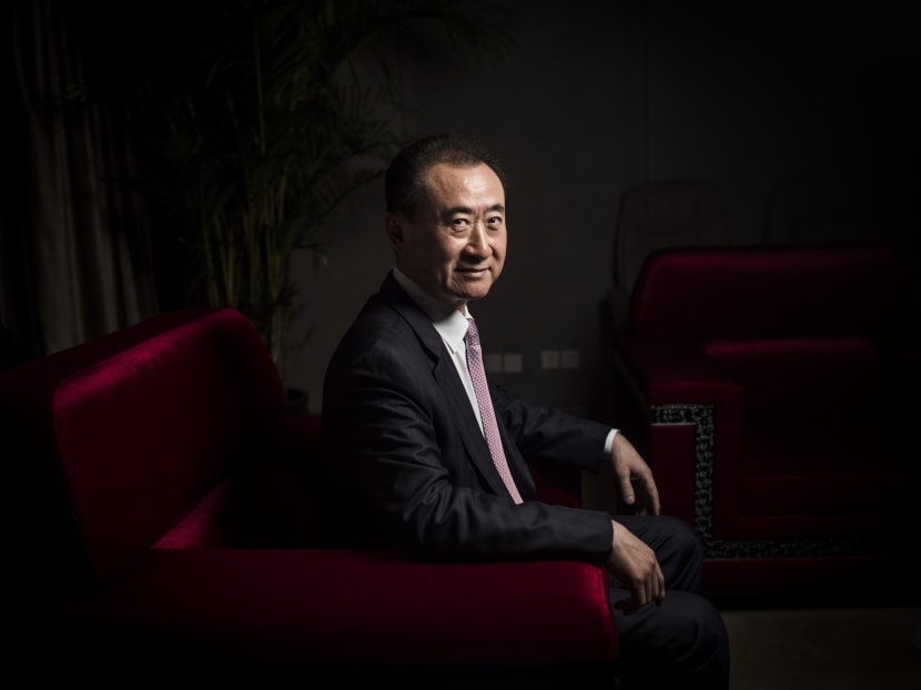 Mr Wang Jianlin, the chairman of China's Wanda Group, said property prices continue to rise in the country's big cities but fall in smaller ones saddled with huge inventories of unsold new homes. Photo: AFP