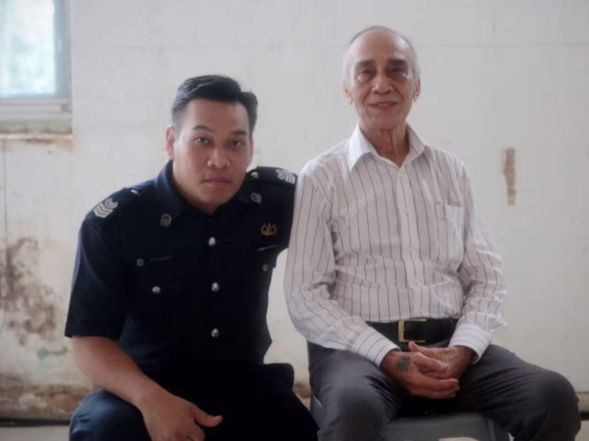 Mr David Jermias Pattiselanno (right), who joined the Mobile Squad in 1956, and his son, Mr Ian Marks Pattiselanno, who is now assistant service quality officer with the Traffic Police. Pattiselanno Snr recalled that the Squad used to line up their bikes for inspection beside the former Red Dot Traffic building, and officers who failed the inspection would have to patrol on foot that day. Photo: Jason Quah/TODAY