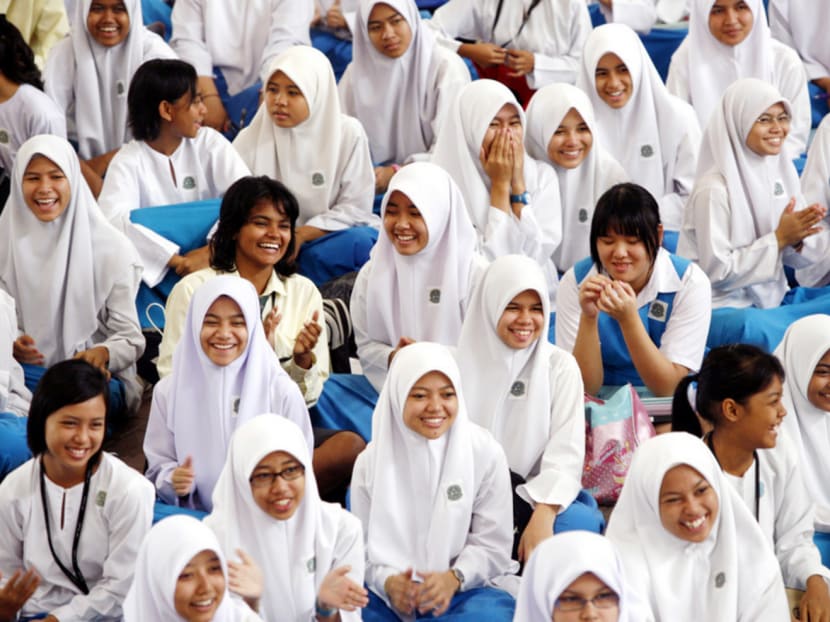 Malay, Indian and Chinese students at a school in Malaysia. Education Minister Mahdzir Khalid said it was difficult to attract non-Malays to national schools because of the existence of vernacular schools. Photo: Reuters