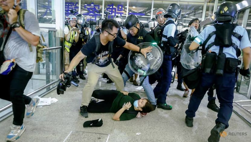 Chaos erupts at Hong Kong airport as protesters clash with police Chaos erupts at Hong Kong airport as protesters clash with police