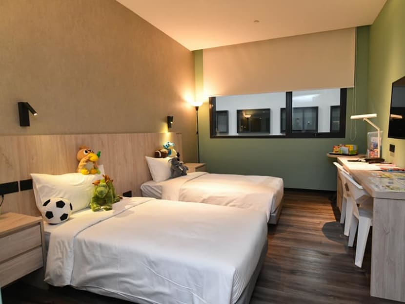 More family rooms are available at Hall 9 of Singapore Expo, so that children infected with Covid-19 may move in with their caregivers. More family rooms are available at Hall 9 of Singapore Expo, so that children infected with Covid-19 may move in with their caregivers.