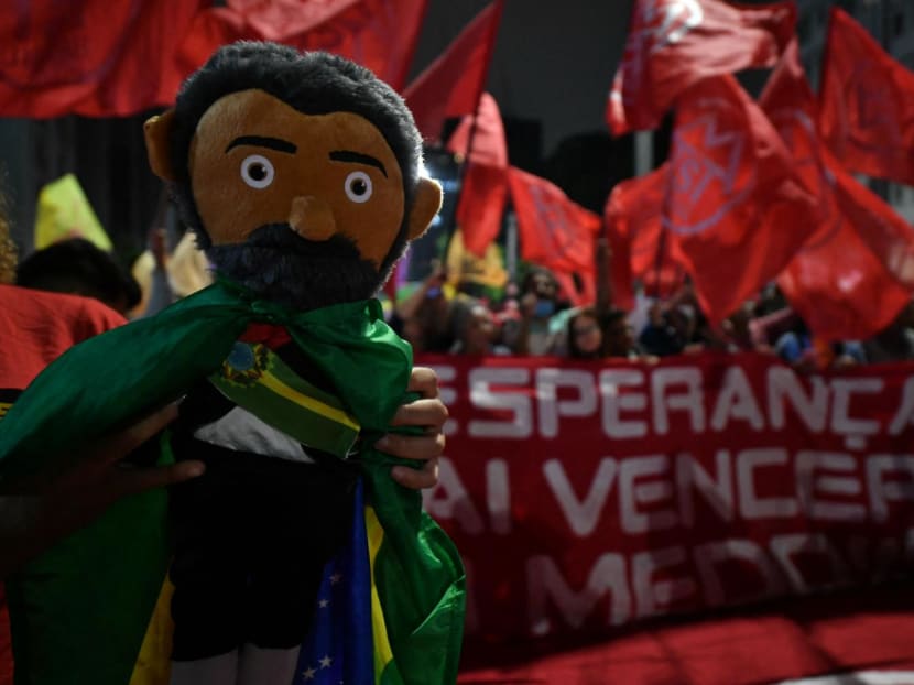 Members of social movements protest in defense of democracy in Sao Paulo, Brazil, on Jan 9, 2023, a day after supporters of Brazil's far-right ex-president Jair Bolsonaro invaded the Congress, presidential palace, and Supreme Court in Brasilia.