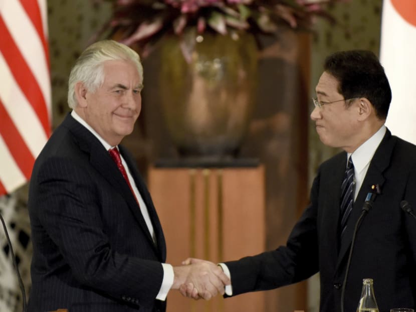 US Secretary of State Rex Tillerson (left) shakes hands with his Japanese counterpart Fumio Kishida (R) at the end of a joint press conference after their talks at the Iikura Guesthouse in Tokyo on March 16, 2017. Tillerson will visit Japan, South Korea and China with tensions soaring in the region. Photo: AFP pool
