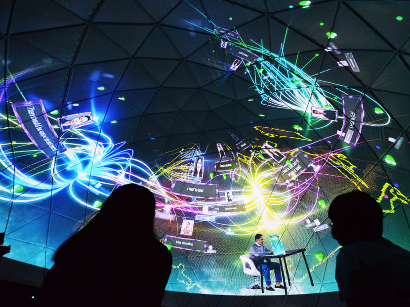 A 360° video display, Theatre of Generations, projected onto the underside of a dome spans Singapore’s beginnings to possibly its years to come at The Future of Us exhibition. Photo: Robin Choo/TODAY