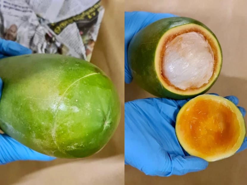 Anti-narcotics officers intercepted a vehicle where a few bundles of drugs were found hidden in a papaya.