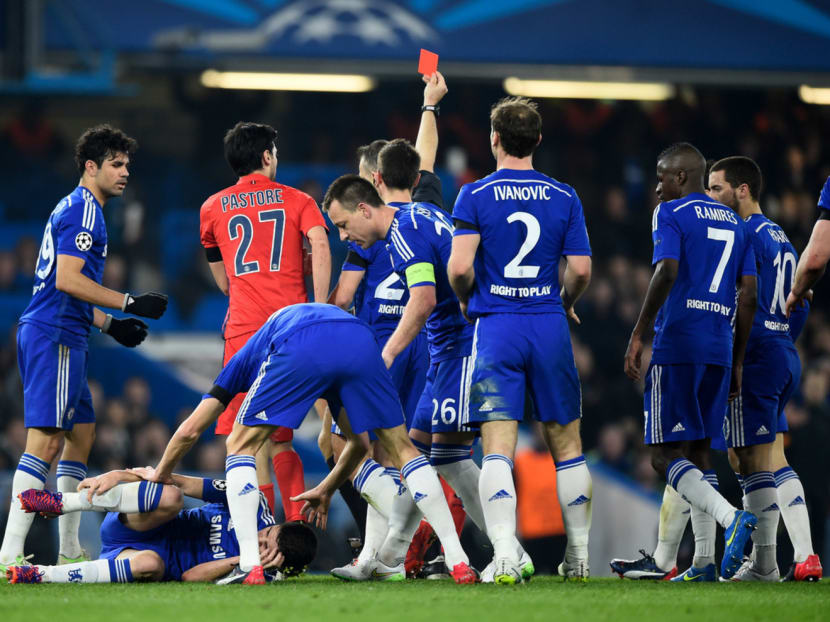 Chelsea players surrounded referee Kuipers to get Ibrahimovic (not pictured) sent off, which they succeeded in doing. PHOTO: GETTY IMAGES