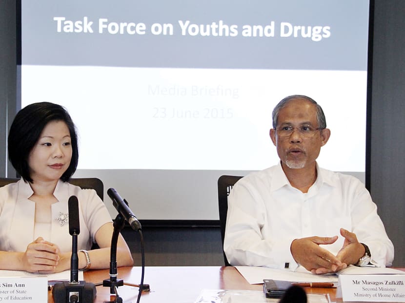 Mr Masagos Zulkifli (right) with Ms Sim Ann from the taskforce on youth and drugs.  Photo: Tristan Loh/TODAY
