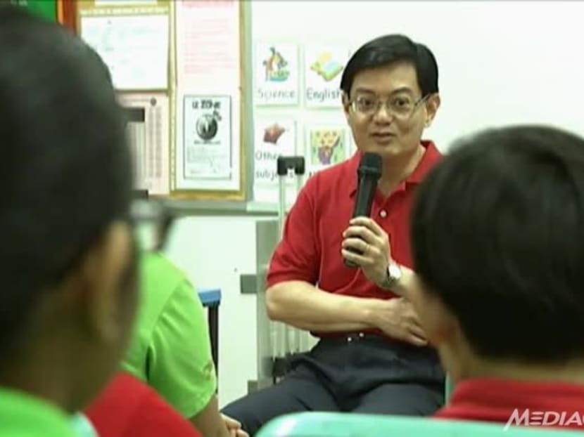 Education Minister Heng Swee Keat speaks to students at West View Primary School on Kindness Day SG. Photo: Channel NewsAsia