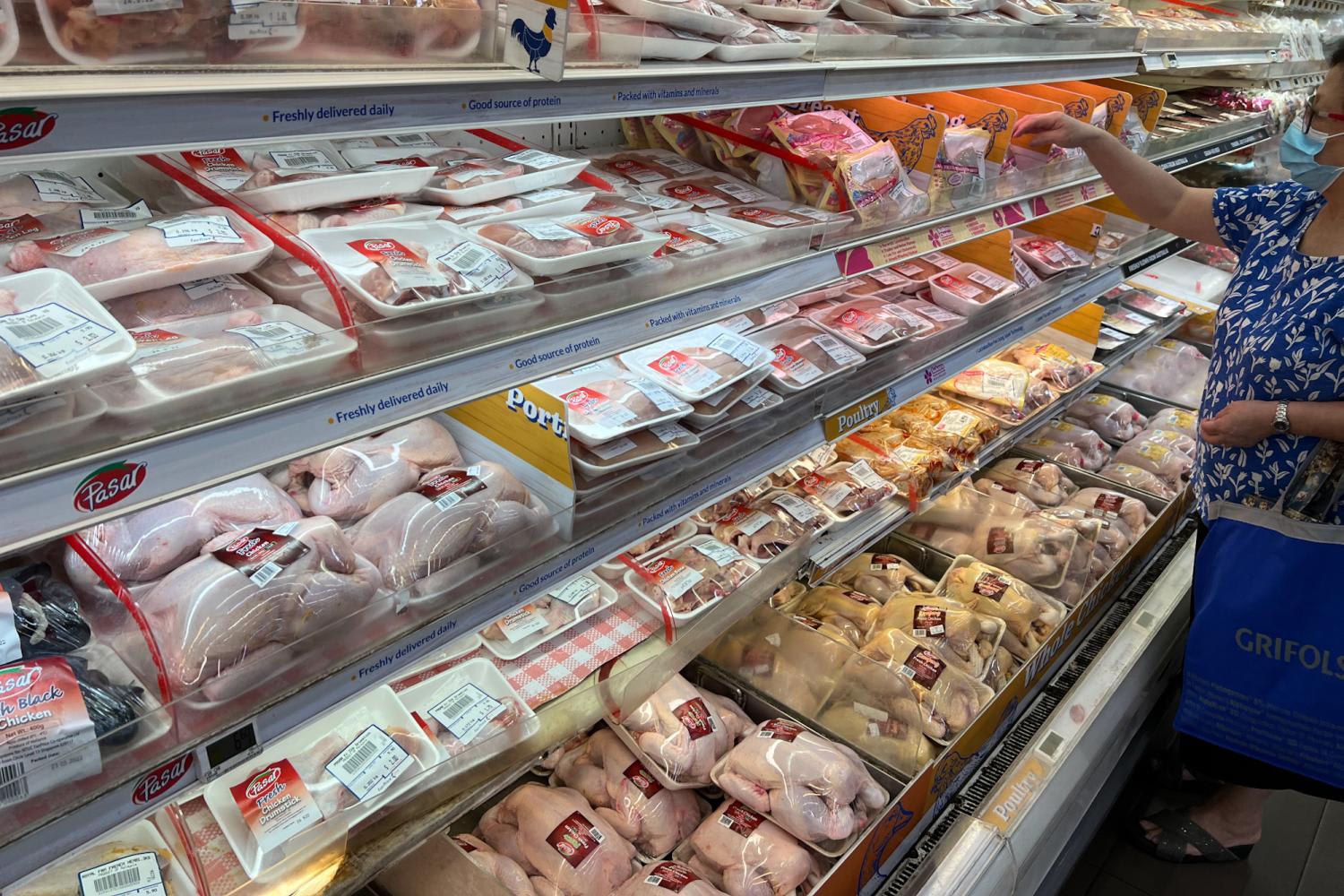 Pre-packed chicken in a supermarket in Singapore. Pre-packed chicken in a supermarket in Singapore.