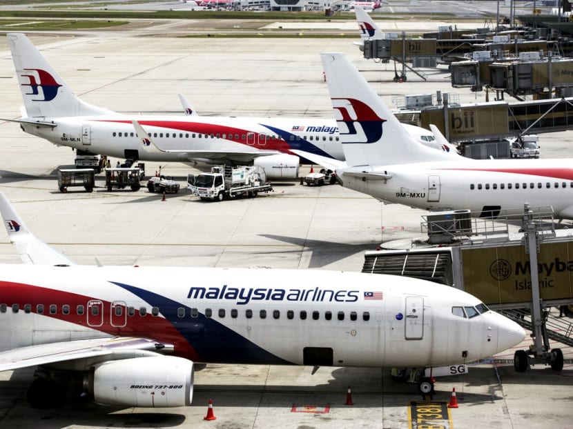 A PAS central committee member repeated calls for alcohol not to be served on Malaysia Airlines flights. Bloomberg file photo