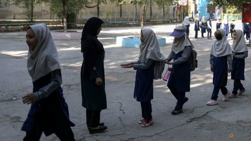 Some Afghan girls return to school, others face anxious wait Some Afghan girls return to school, others face anxious wait