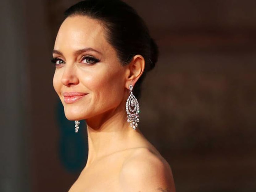 Angelina Jolie, George Clooney and other celebrities give back to COVID-19 relief Angelina Jolie, George Clooney and other celebrities give back to COVID-19 relief