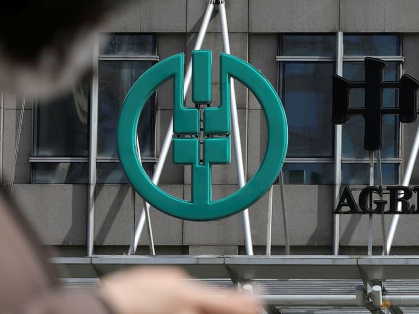 FILE PHOTO: A sign of Agricultural Bank of China is seen at its office building in Beijing, China March 29, 2021. REUTERS/Tingshu Wang/File Photo GLOBAL BUSINESS WEEK AHEAD FILE PHOTO: A sign of Agricultural Bank of China is seen at its office building in Beijing, China March 29, 2021. REUTERS/Tingshu Wang/File Photo GLOBAL BUSINESS WEEK AHEAD