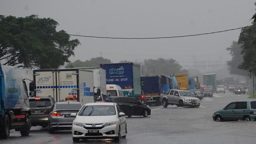 Thousands evacuated as floods hit several Malaysian states; Port Klang operations affected Thousands evacuated as floods hit several Malaysian states; Port Klang operations affected