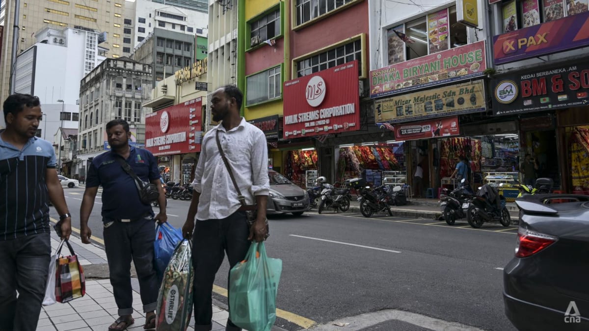 In Malaysia, non-Malay language signboards are turning into a political hot potato In Malaysia, non-Malay language signboards are turning into a political hot potato