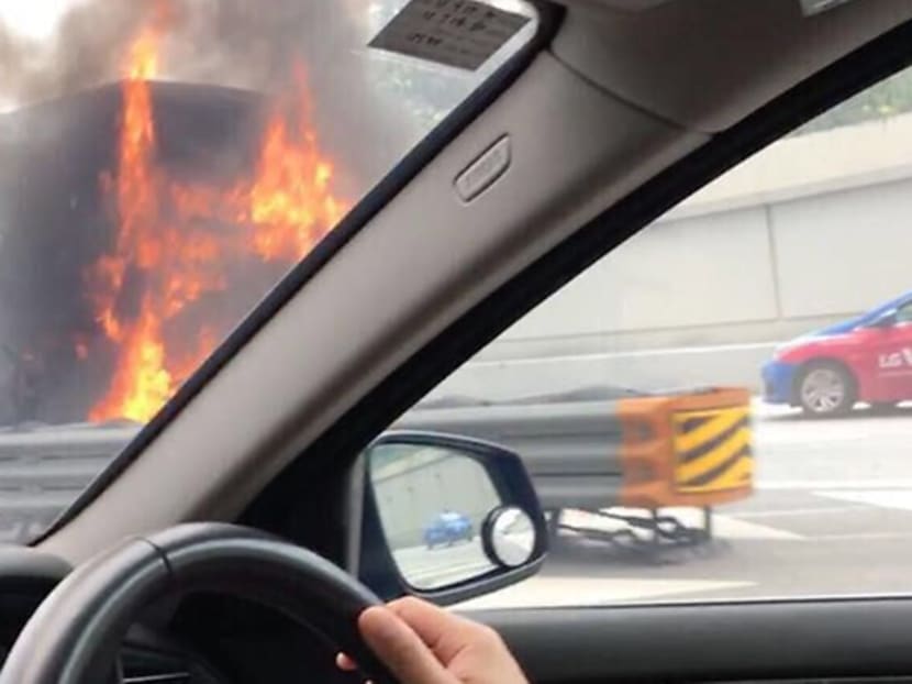An exit lane on the East Coast Parkway (ECP) has been closed after a private bus travelling towards Changi caught fire at around 2pm on Sunday (Jan 7) afternoon. Photo: Telegram/SG No 1 all-in-1 sharing
