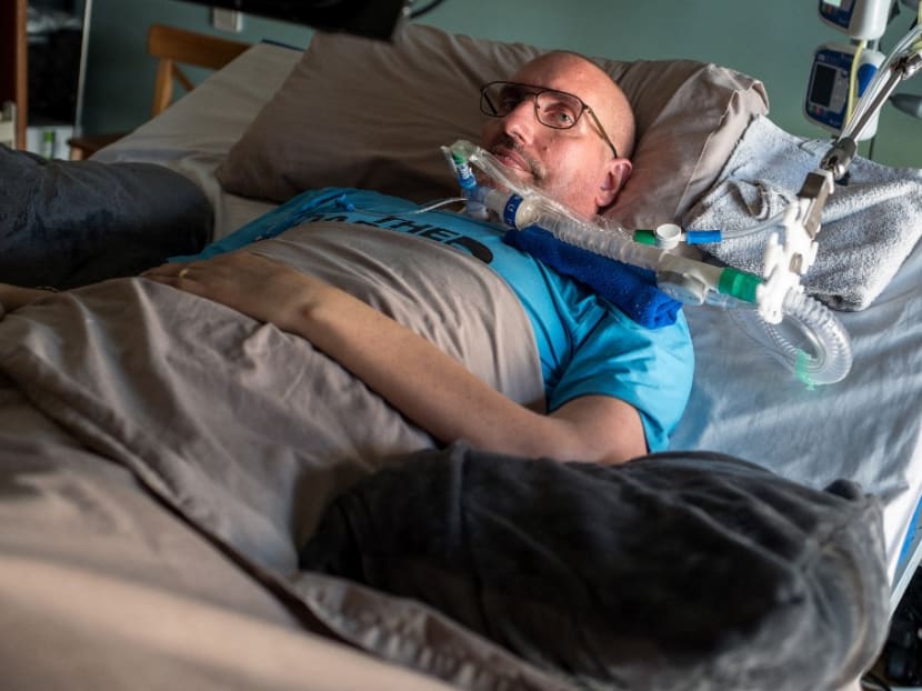 Mr Guilhem Gallart, known as Pone, lies on a bed at his home in Gaillac in the south of France on June 16, 2021. Pone is a music producer and member of the Fonky Family group. Since 2015, he suffers from Charcot's disease, amyotrophic lateral sclerosis.