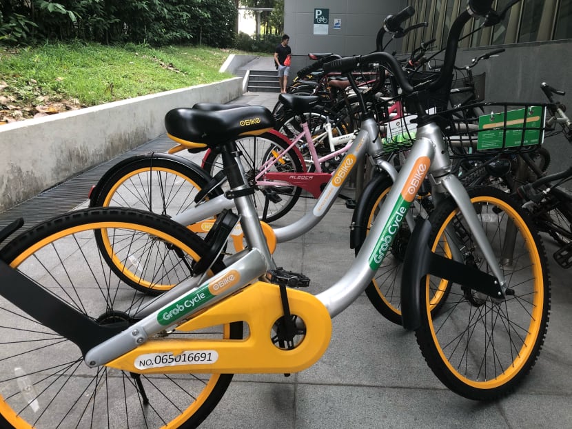 An oBike bicycle outside one-north MRT station sporting GrabCycle livery. Pictures of oBike bicycles sporting GrabCycle livery have been making their rounds on social media since the two companies announced a tie-up in January. Photo: Louisa Tang/TODAY