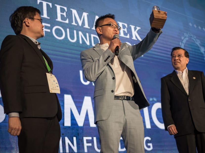 Winners of The Liveability Challenge 2019, co-founders of Sophie’s Kitchen, Mr Barnabas Chan (left) and Mr Eugene Wang (centre), with Mr Lim Hock Chuan, Chief Executive of Temasek Foundation Ecosperity.
