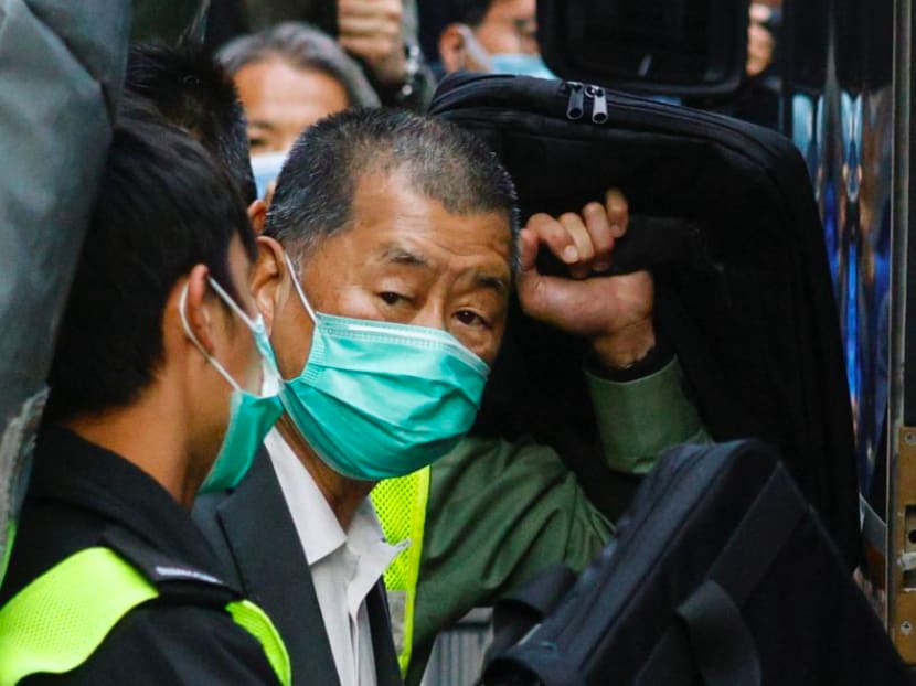 Media tycoon Jimmy Lai, founder of Apple Daily, looks on as he leaves the Court of Final Appeal by prison van, in Hong Kong, on Feb 1, 2021. 