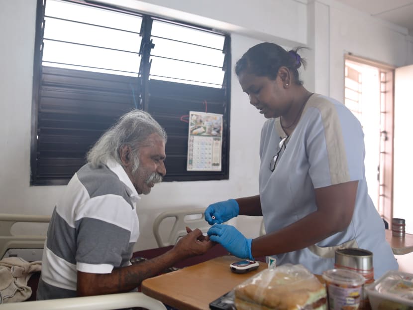 Home Nursing Foundation nurse Chitra Kumarasamy on a home visit. Community nurses, advanced practice nurses and pharmacists will play a bigger role in community care. Photo: Najeer Yusof/TODAY