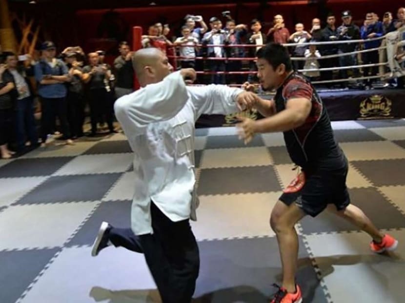 Tai chi master Wei Lei (left) was no match in combat for MMA fighter Xu Xiaodong. Photo: Handout via SCMP