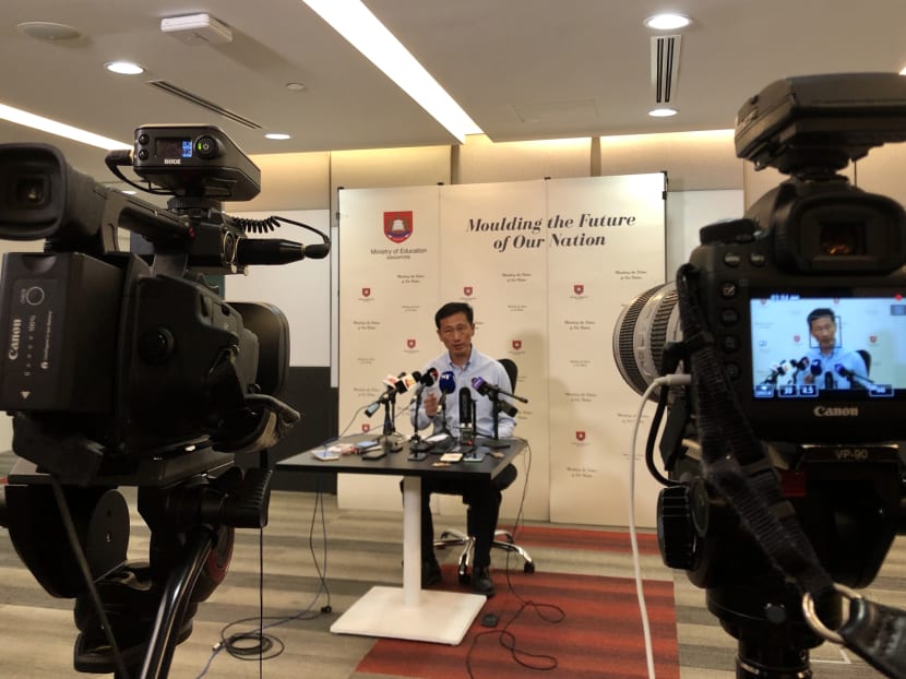 Education Minister Ong Ye Kung speaking to the media on Friday (March 27).