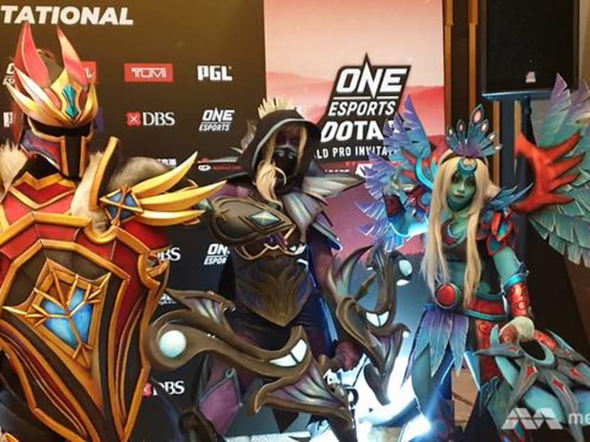 Cosplayers pose at ONE E-Sports Dota World Pro Invitational press event on Wed (Dec 18).