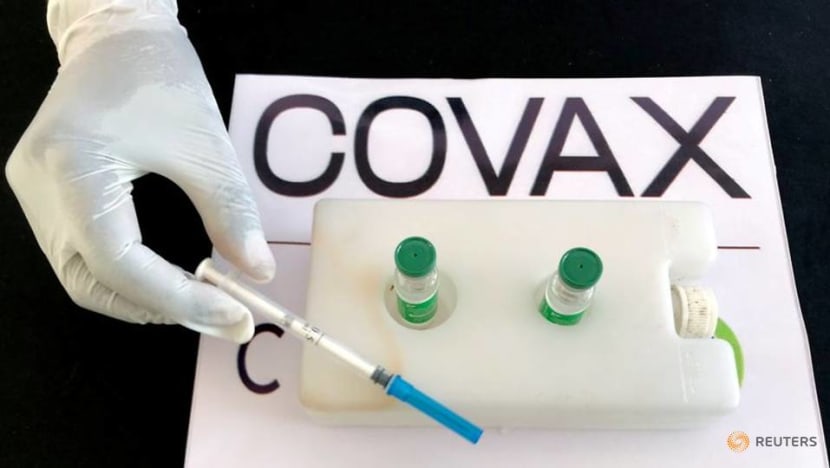 US debates fairest way to share spare COVID-19 vaccines