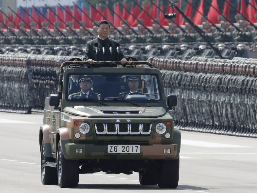 President Xi has used a combination of psychological intimidation and institutional mechanisms to win the PLA’s backing to dominate China’s political landscape, says the author.  Photo: AP
