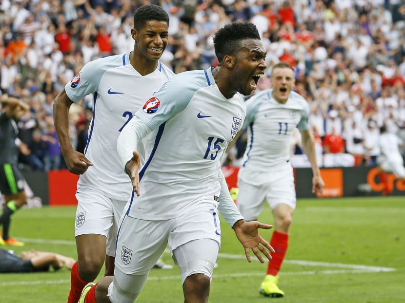England's Daniel Sturridge (front) celebrates after scoring his side’s second goal during the Euro 2016 Group B soccer match between England and Wales. Behind are Marcus Rashford (left) and Jamie Vardy. Photo: AP