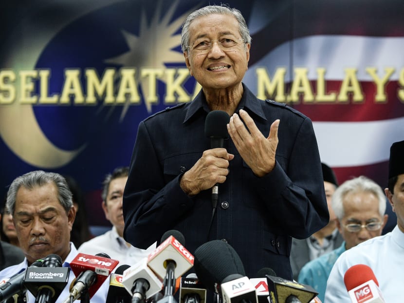 Former Malaysian leader Mahathir Mohamad addresses a press conference where leaders from across Malaysia’s political spectrum joined forces to call for a national movement to remove scandal-hit Prime Minister Najib Razak. Photo: AFP