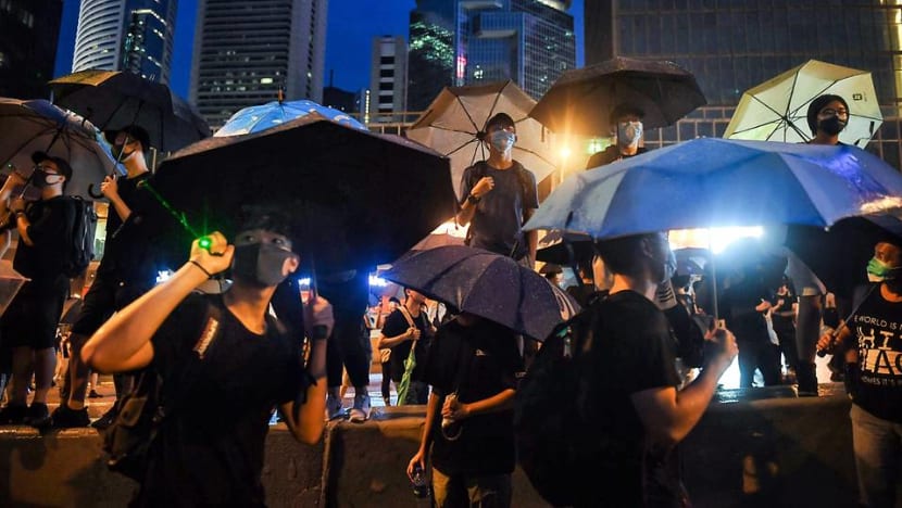 Hong Kong police say protesters shot hard objects, pointed laser beams after 'peaceful' rally Hong Kong police say protesters shot hard objects, pointed laser beams after 'peaceful' rally