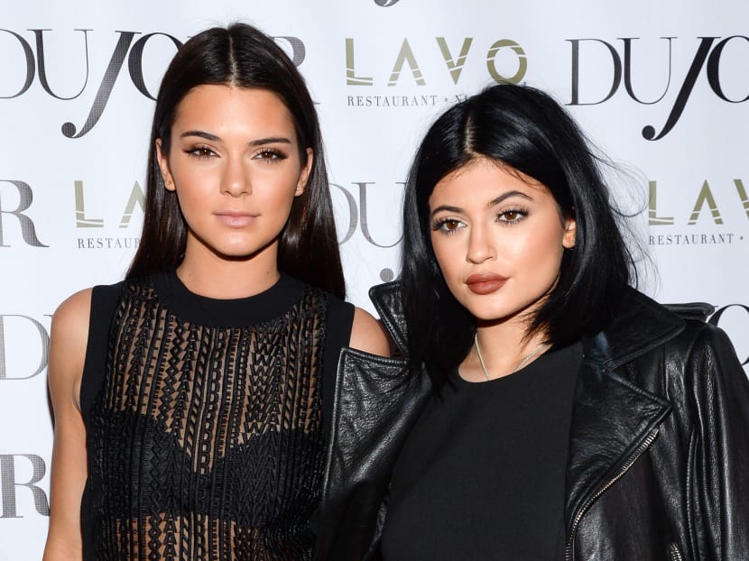 Kendall Jenner (left) and Kylie Jenner celebrate DuJour's Fall Issue in New York. The mobile video game developer responsible for the popular Kim Kardashian: Hollywood game announced plans to develop a title starring Kardashian half-sisters Kendall and Kylie Jenner. Photo: AP