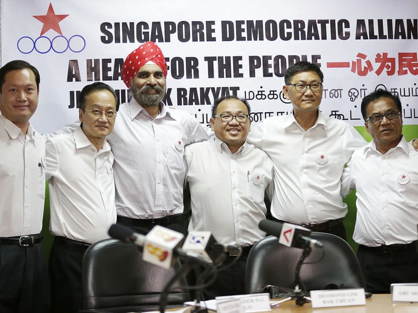 (From left) SDA candidates Ong Teik Seng, Arthero Lim, Harminder Pal Singh, Desmond Lim, Sunny Wong and Abu Mohamed say they have 19 improvement plans for Pasir Ris-Punggol. Photo: Wee Teck Hian