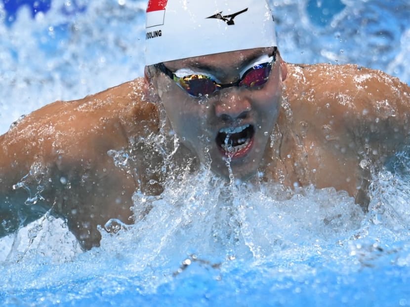 Joseph Schooling competes in a heat for the men's 100m butterfly swimming event during the Tokyo 2020 Olympic Games at the Tokyo Aquatics Centre in Tokyo on July 29, 2021.