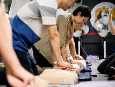 People receive CPR training as they practice on dummys during a civil defence drill against possible artillery attacks by North Korea, in a subway station in Seoul on Aug 23, 2023.