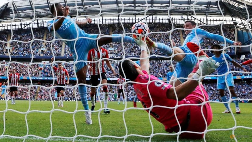 Football:
Liverpool go top with win over Palace as City held by Saints Football:
Liverpool go top with win over Palace as City held by Saints