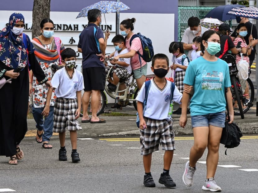 Children walking home after school. Singapore is set to roll out vaccination against Covid-19 for children aged five to 11.