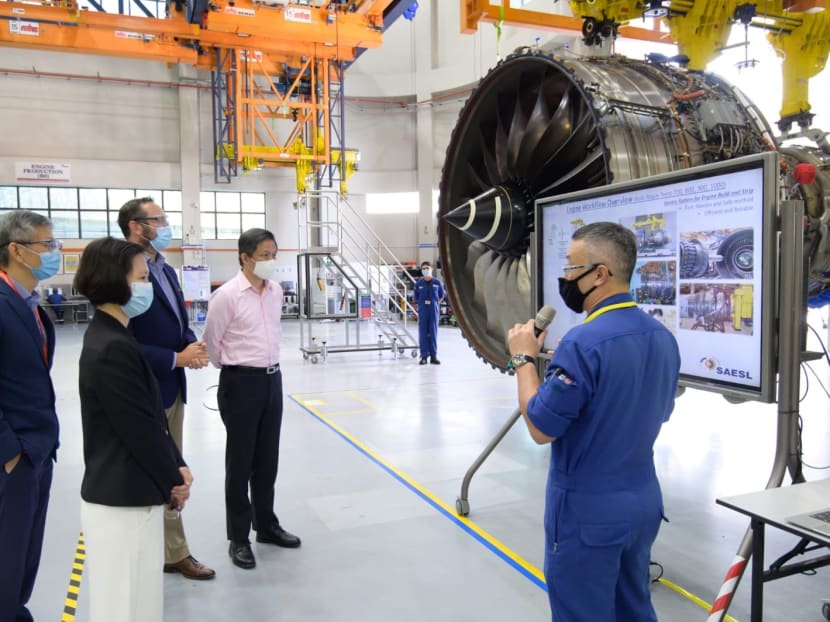 Minister for Trade and Industry Chan Chun Sing (second from right) and Ms Gan Siow Huang (second from left), Minister of State for Education and Manpower, visited Singapore Aero Engine Services on Sept 1, 2020.